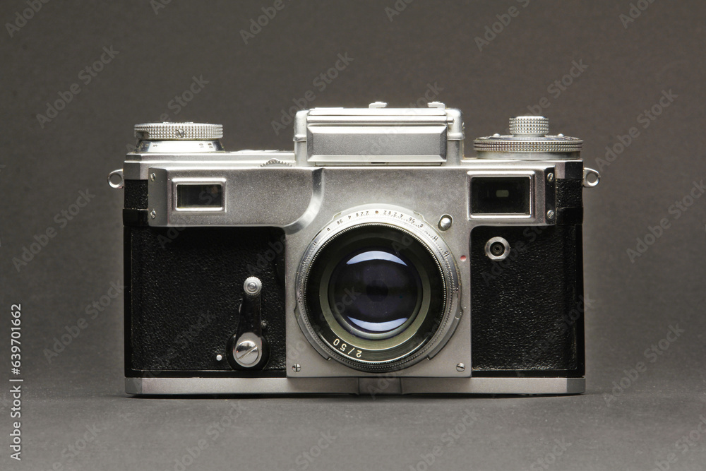 Antique camera on a grey background