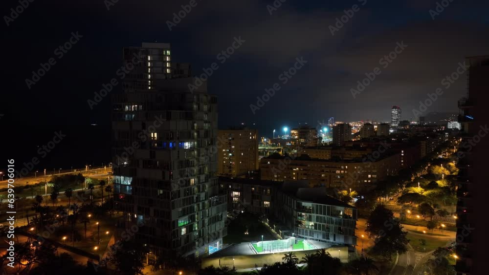 night illumination barcelona city beach bay apartment building aerial panorama 4k spain night illumination barcelona city beach bay apartment building aerial panorama 4k spain