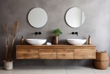 Wooden wall mounted vanity with white vessel sinks on concrete wall. Minimalist style interior design of modern bathroom