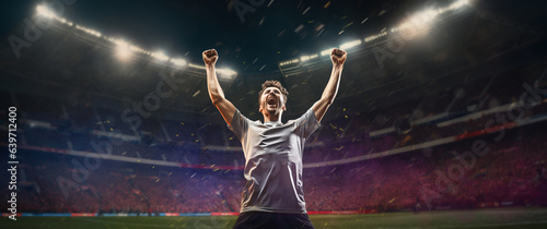  soccer players cheering in a large stadium - big horizontal poster panorama concept