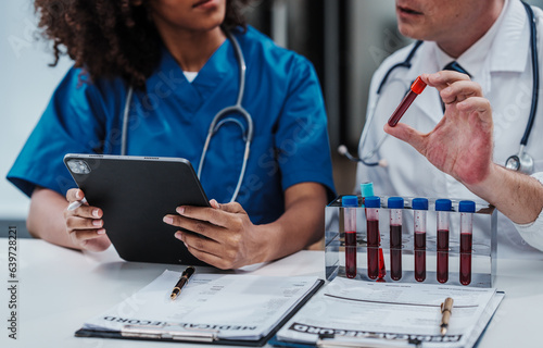 Wallpaper Mural Team meeting lab assistant african american people holding test tube with blood sample research and development of antiretroviral drugs, diabetes, osteoporosis, Monkeypox, Anxiety Disorder Torontodigital.ca