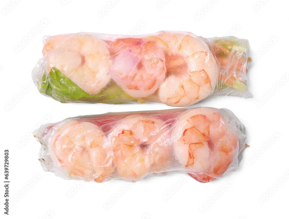 Tasty spring rolls with shrimps and lettuce wrapped in rice paper on white background, top view Tasty spring rolls with shrimps and lettuce wrapped in rice paper on white background, top view