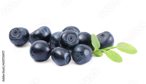 Tasty ripe bilberries and green leaves isolated on white