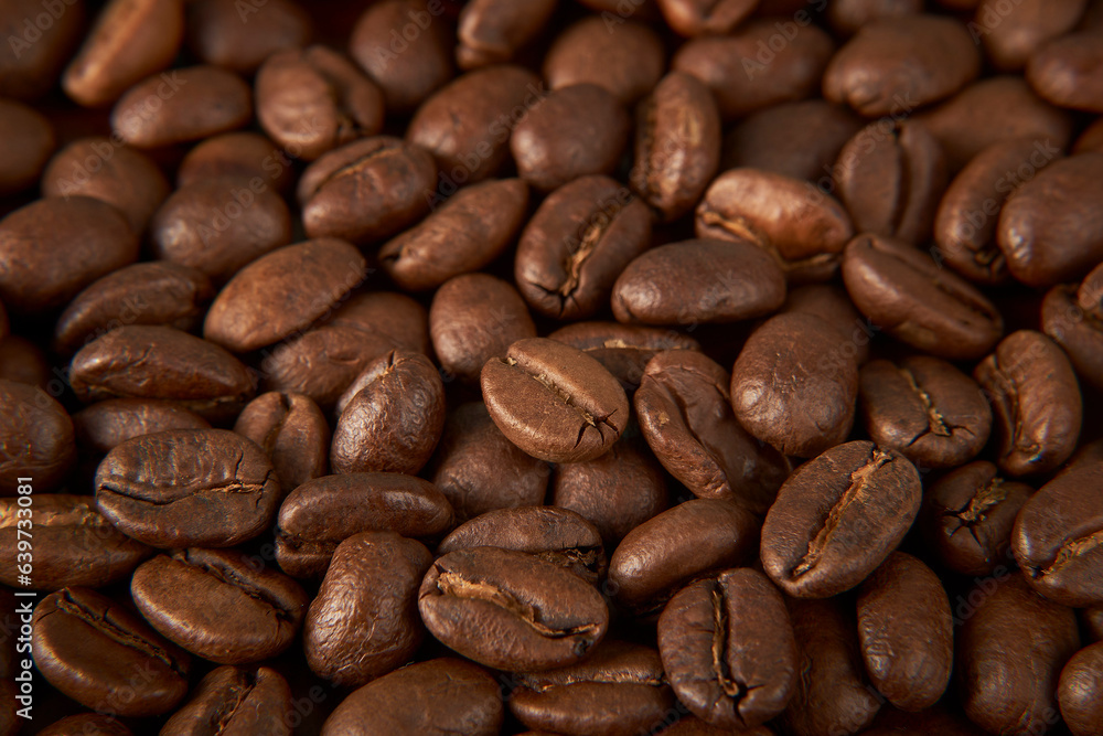 Fototapeta premium Aromatic Elegance: A close-up masterpiece capturing the intricate details of coffee beans on a rich wooden texture. The interplay of texture and aroma unfolds against a warm backdrop