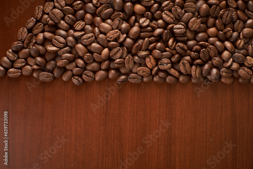 Aromatic Elegance: A close-up masterpiece capturing the intricate details of coffee beans on a rich wooden texture. The interplay of texture and aroma unfolds against a warm backdrop © German Rojas