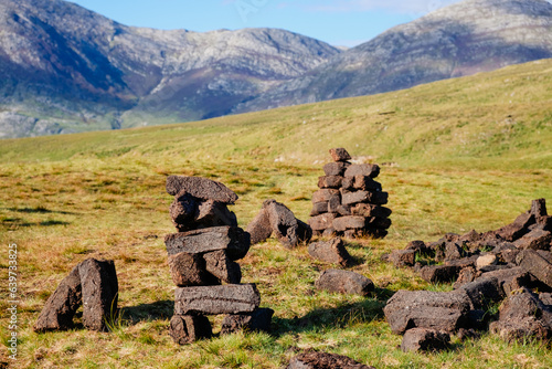 Peat blocks, in a traditional peat bog, on the coast of Ireland photo