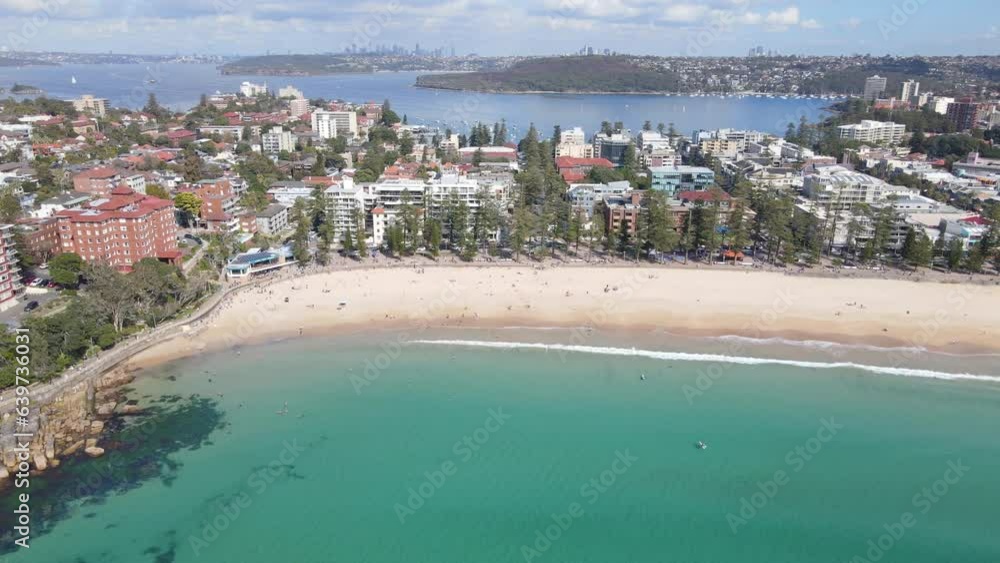 Aerial drone view of Manly Beach on the Northern Beaches of Sydney, NSW Australia with the North Harbour in the background in August 2023 Aerial drone view of Manly Beach on the Northern Beaches of Sydney, NSW Australia with the North Harbour in the background in August 2023