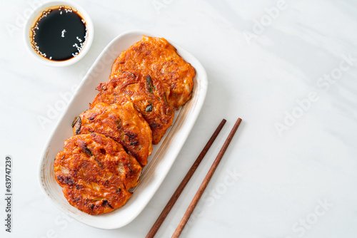 Korean Kimchi pancake or Kimchijeon - Fried Mixed Egg, Kimchi, and Flour