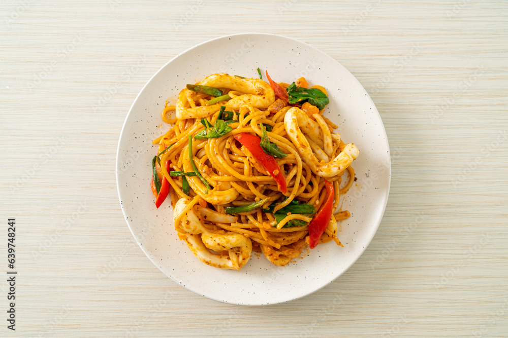 stir-fried spaghetti with salted egg and squid