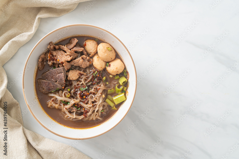 Thai noodle with pork, stewed pork, meatball and pork liver in blood soup Thai noodle with pork, stewed pork, meatball and pork liver in blood soup