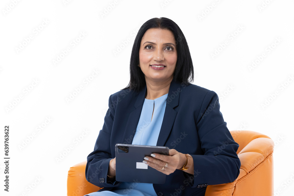Confident woman holding digital tablet over white background Confident woman holding digital tablet over white background