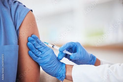 Healthcare, vaccine and needle on arm of person in hospital for covid, flu or immunization closeup, Doctor, hands and zoom on patient at a clinic for medical, consultation and vaccination injection photo