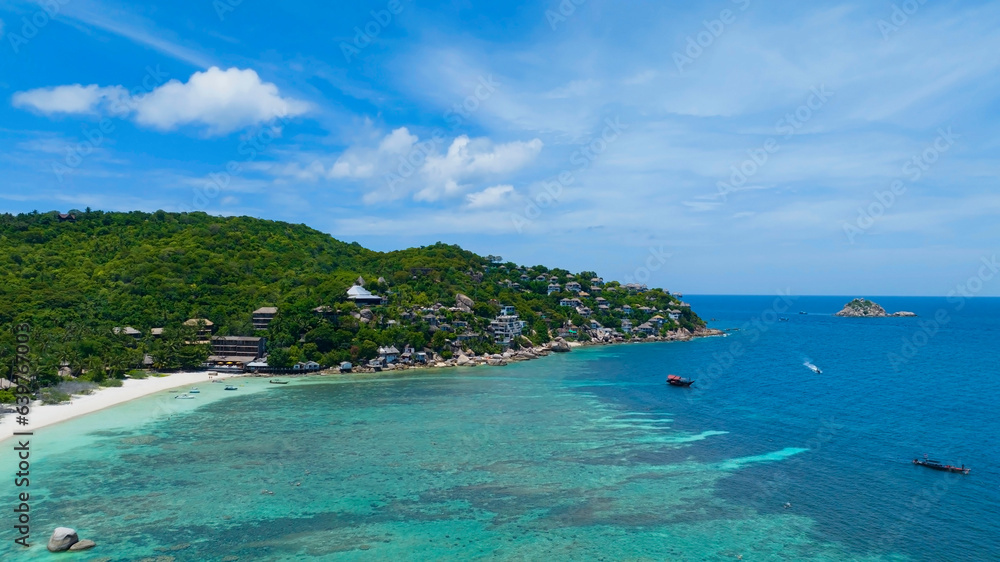 Fototapeta premium The tropical seashore island in a coral reef ,blue and turquoise sea Amazing nature landscape with blue lagoon