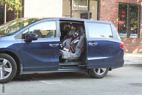 Open minivan with carseats installed