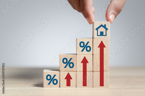 Property rates and real estate interest, interest rates, inflation, mortgage loans, tax increases. Increasing interest rates concept.