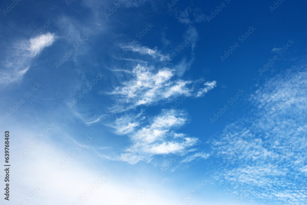 White clouds and blue sky textured background White clouds and blue sky textured background