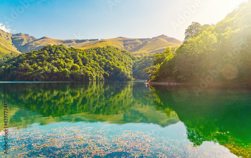 The alpine lake MaralGol is located in the GoyGol National Park in Azerbaijan photo