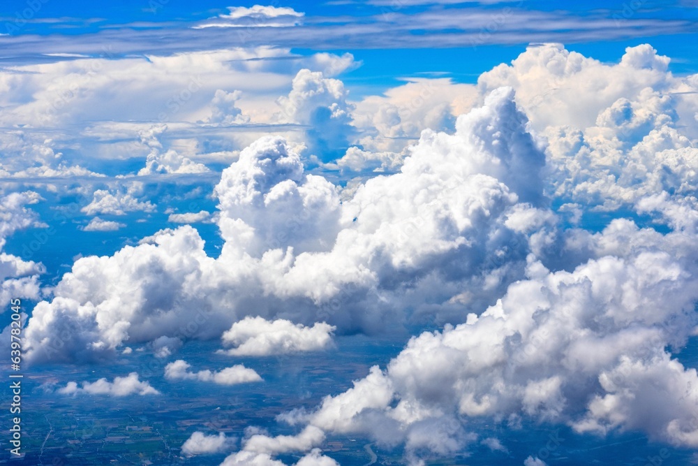 Aerial view of clouds in the blue sky. Nature background.