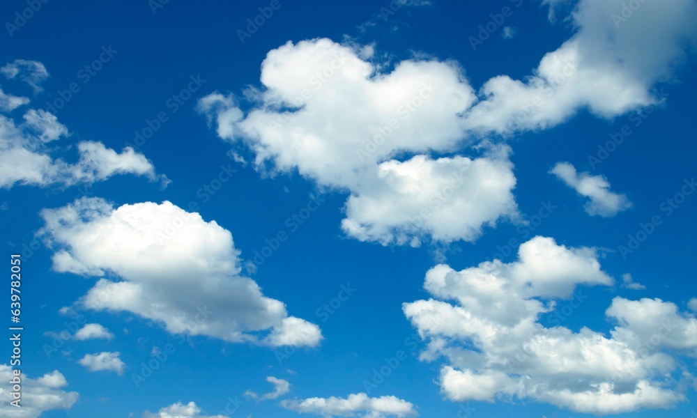 Blue sky background with tiny cloudsbe used as a background Blue sky background with tiny cloudsbe used as a background