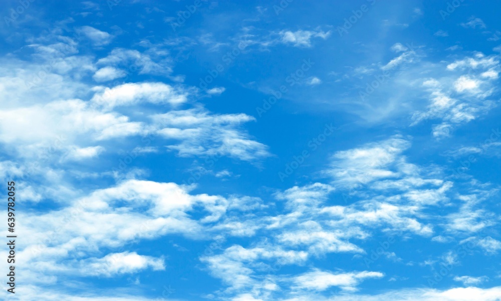 Blue sky background with tiny clouds. Abstract background of blue sky with tiny clouds.