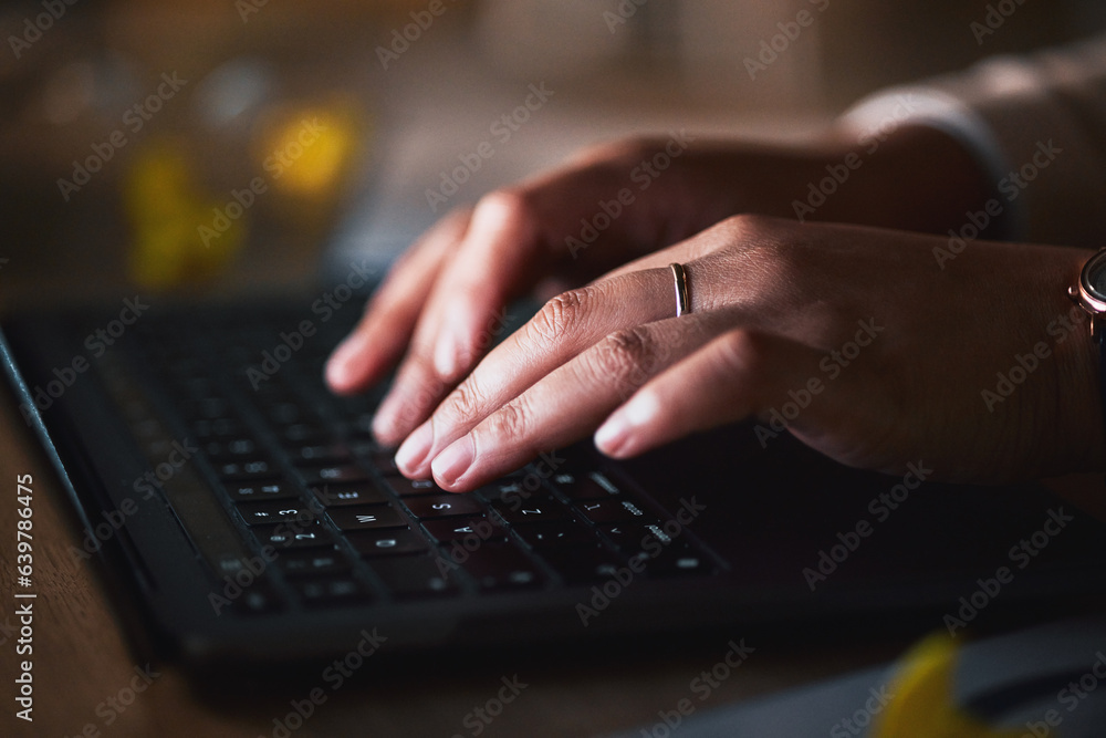 Laptop, hands typing and closeup of keyboard at table, research and working late on deadline at night. Computer, internet and professional at desk, networking consultant and writing business email Laptop, hands typing and closeup of keyboard at table, research and working late on deadline at night. Computer, internet and professional at desk, networking consultant and writing business email