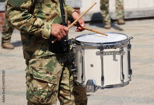 Soldier drummer marching in a row outdoor photo