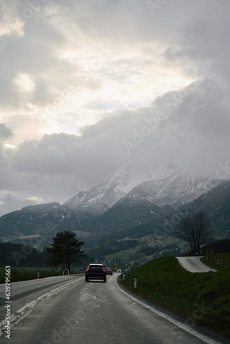 Road to the Alps. Majestic Alpine Journey. Scenic Highway Road Leading to the Splendor of the Alps. © AlexGo
