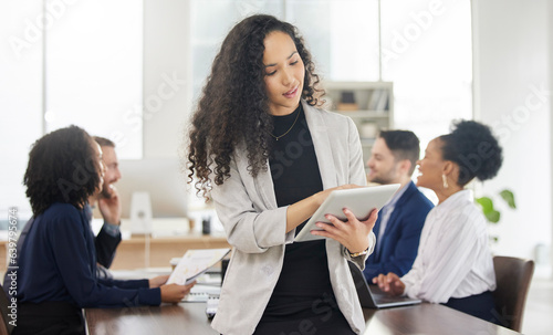 Business woman, planning and tablet in meeting with team for project management or discussion of digital marketing strategy. Corporate, employee and work in Brazil in communication or online research