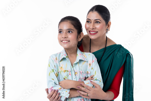 Portrait of hugging mother and daughter happy together,