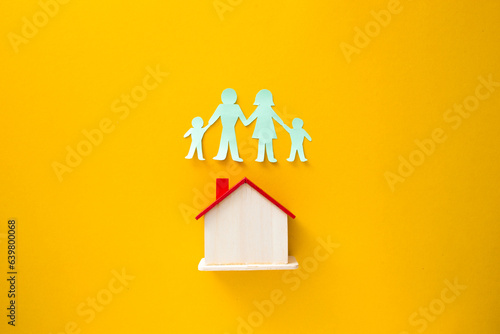 Tablou pe pânză Paper cutout of family (father, mother, son and daughter)