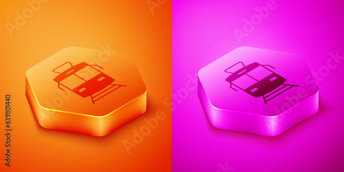 Isometric Tram and railway icon isolated on orange and pink background. Public transportation symbol. Hexagon button. Vector