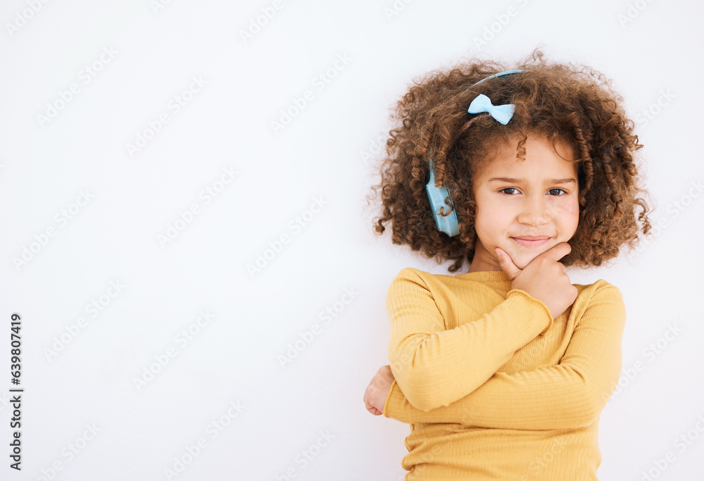 Child, headphones and portrait with music, radio streaming and web audio in a studio. Happy, young girl and kid with white background and mockup space for marketing with kids sound and listening Child, headphones and portrait with music, radio streaming and web audio in a studio. Happy, young girl and kid with white background and mockup space for marketing with kids sound and listening