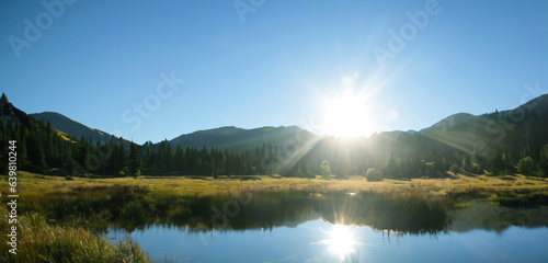 Mountains rural pond Panorama view of the scenery In the evening when the sun shines © nana