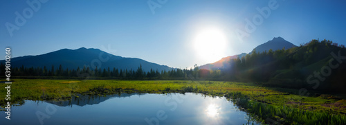 Panorama of landscapes mountains rural ponds in the evening when the sun is shining
