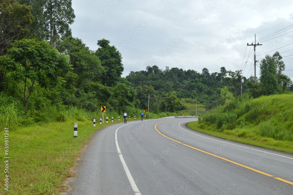 bicycle on the road to the mountains