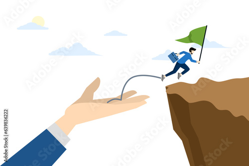 concept of helping hand or support to help achieve success, help to reach next level, solution or encouragement of employee, hand helping business people to jump over cliff to achieve success.