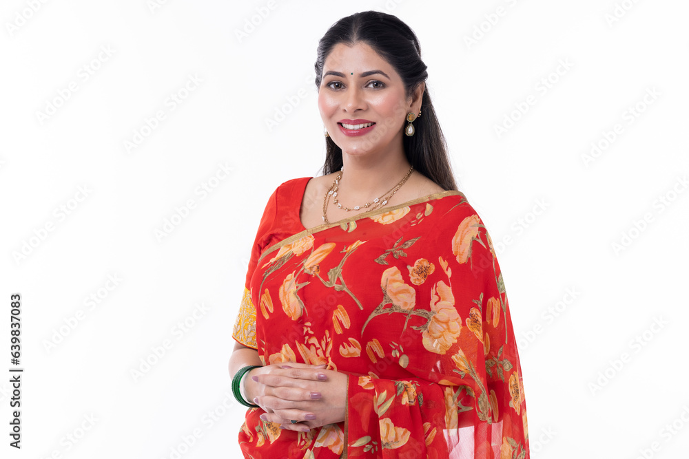 Portrait of smiling woman in traditional Indian sari isolated on white background Portrait of smiling woman in traditional Indian sari isolated on white background