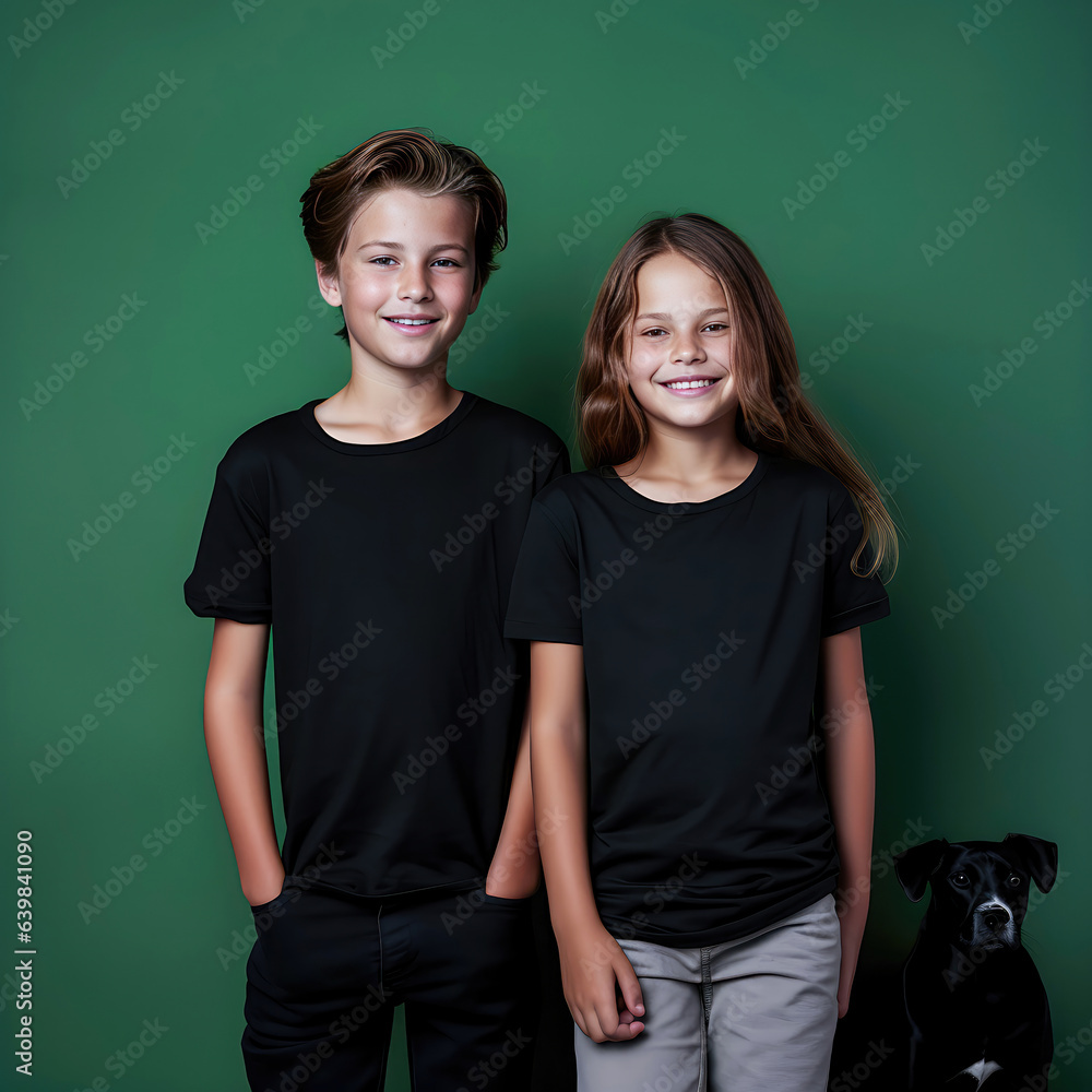 two young children posing for a photo with a dog in front of a green wall. two young children posing for a photo with a dog in front of a green wall.