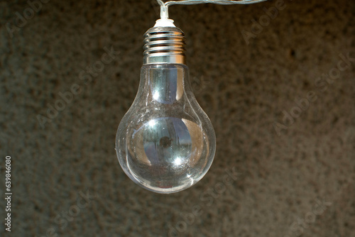 Decotative light bulbs hanging on wire  © PumpedVisuals