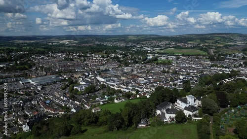 Newton Abbot, South Devon, England: DRONE VIEWS: Wolborough Hill (foreground); the historic market town of Newton Abbot, Newton Abbot racecourse; Dartmoor National Park (horizon).  photo