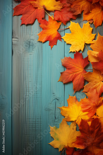 Autumn concept  Fall background with maple leaves on wood  with space for text