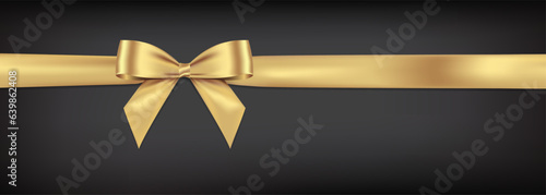 Realistic Gold bow shiny satin and long horizontal ribbon  with shadow,golden ribbon for decorate your wedding card,certificate or gift card,vector EPS10 isolated on black gradient background.