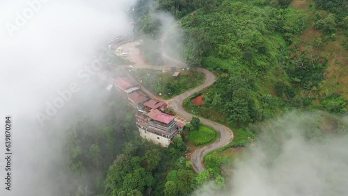 Aerial view Ban Pha Hee with misty fog famous place in Chiang-Rai, Thailand.  photo