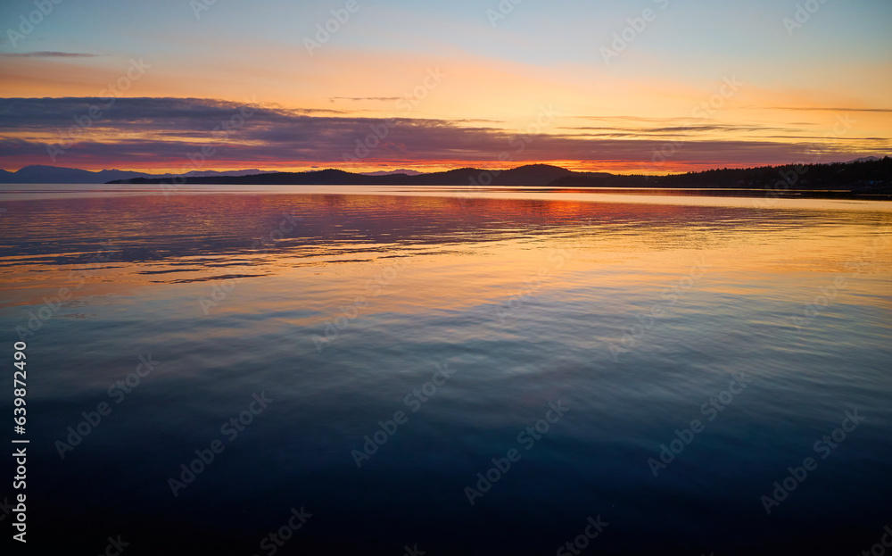Sunset over the sea Halfmoon Bay. Sunshine Coast, British Columbia, Canada