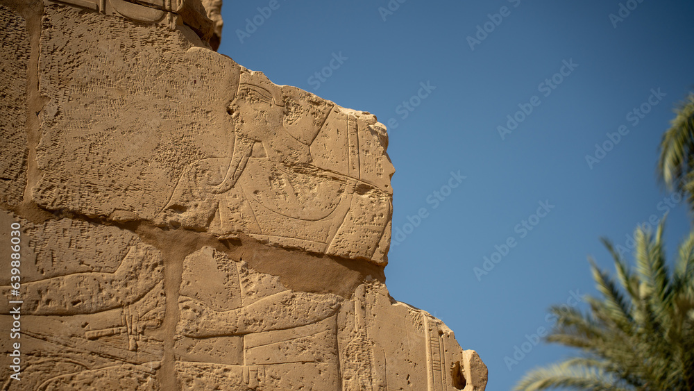 Sandstone wall ruins at the temple of Karnak, Luxor