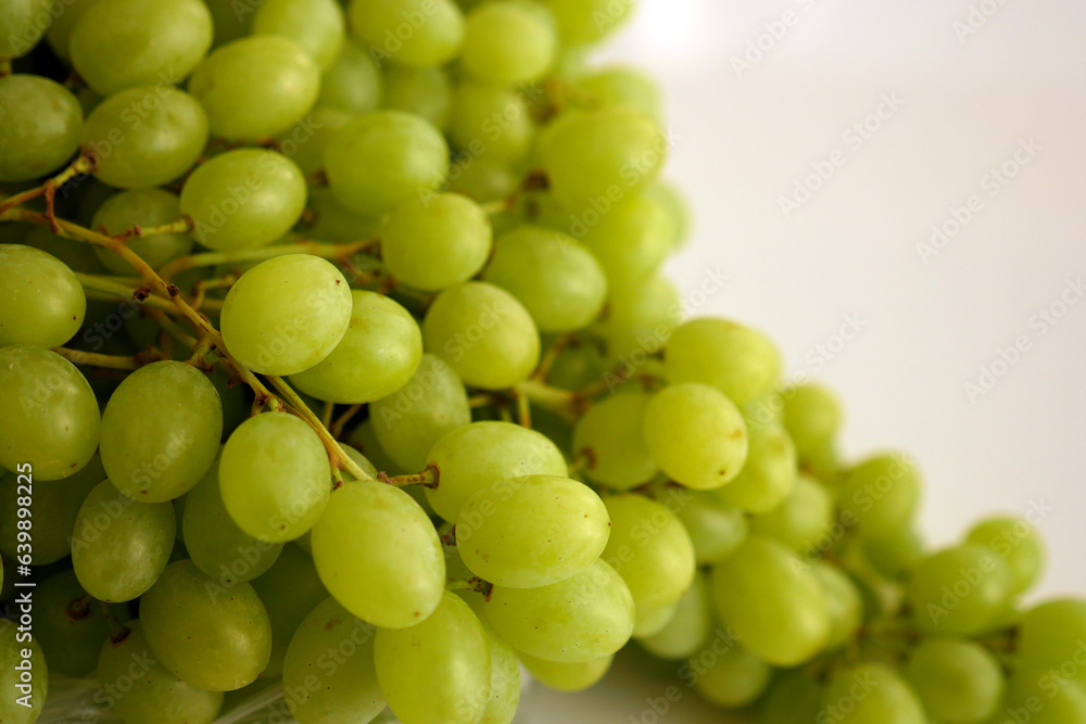 fresh seedless bunch grapes, on a white background