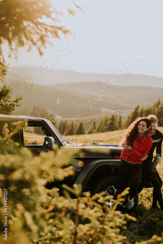Young couple relaxing by a ...