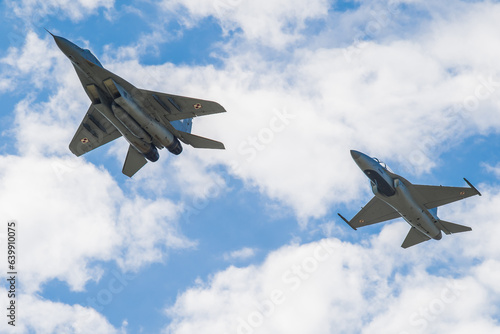 Obraz na płótnie FA-50 and Mig 29. Mig- 29 Polish Air Force. MIG in the air. w salonie