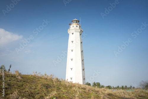 Lighthouse Serenity: Scenic Grassland Surroundings of Glagah Beach, Kulon Progo, Daerah Istimewa Yogyakarta