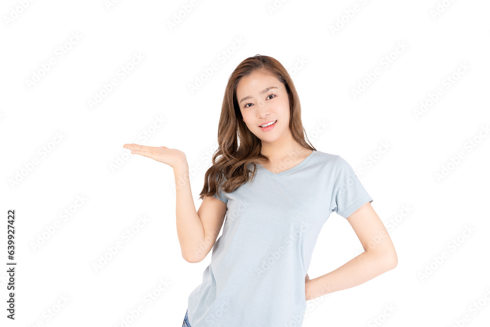 Happy beautiful young asian woman blue background holding copy space imaginary on beauty palm for insert advertisement looking at camera happiness and smiley face Attractive beautiful girl portrait Happy beautiful young asian woman blue background holding copy space imaginary on beauty palm for insert advertisement looking at camera happiness and smiley face Attractive beautiful girl portrait